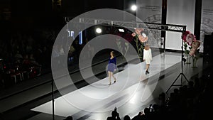 Defile attractive women close up colorful dress on catwalk model show vogue 4K. photo