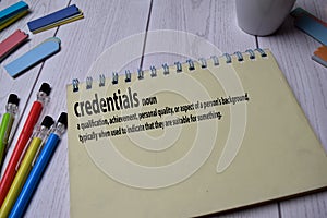 Definition of Credentials word with a meaning on a book. dictionary concept