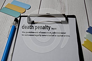 Definition of Death Penalty word with a meaning on a book. dictionary concept