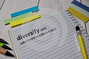 Definition of Diversify word with a meaning on a book. dictionary concept
