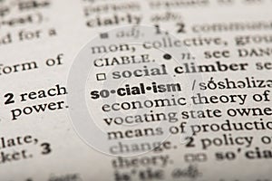 Closeup of the word `Socialism` in a dictionary photo