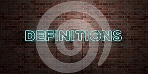 DEFINITIONS - fluorescent Neon tube Sign on brickwork - Front view - 3D rendered royalty free stock picture photo