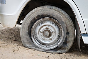 Deflated damaged tyre