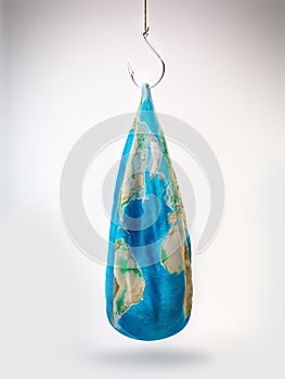 Deflated Earth hanging on a fish hook photo