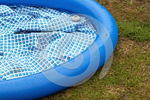 A deflated inflatable pool