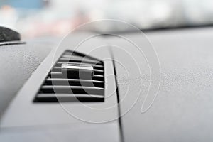 The deflector on the grey panel of the car. car heating and air conditioning system photo