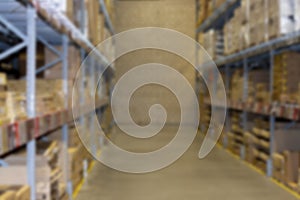 Defocus background warehouse. Industrial storage room with shelves and boxes