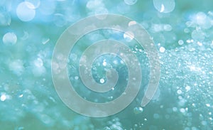 Defocused abstract background with bubbles. Underwater bubbles with shiny blur through water surface