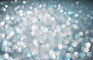 Defocused abstract colorful twinkle light background. Glittery bright shimmering background.