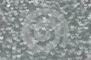 Defocused abstract grey hearts light background
