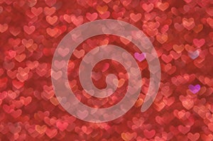 Defocused abstract red hearts light background