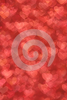 Defocused abstract red hearts light background