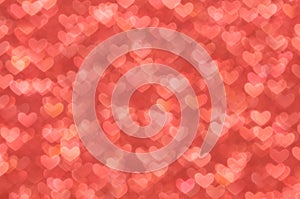 Defocused abstract red hearts light background