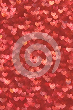 Defocused abstract red hearts light background