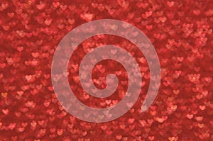 Defocused abstract red hearts light background