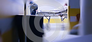 Defocused blur conceptual image of patient on the ward bed being transported