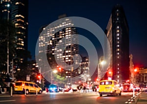 Defocused blur of New York City street scene at night