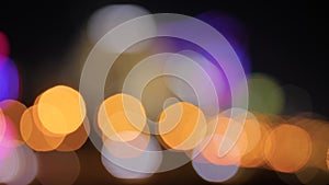 Defocused blurred city light bokeh background with night illumination