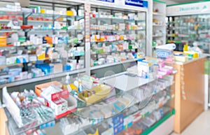 Defocused blurred image of inside pharmacy store for abstract background