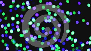 Defocused or blurred round lights, circles on full black screen.