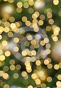 Defocused bokeh. Twinkling light purple bokeh abstract background for Christmas and Happy new year holiday. Festive elegant