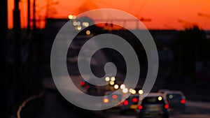 Defocused car lights on the night bridge