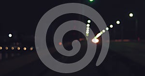 Defocused carlights on overpass in the night. Night shot of busy street traffic