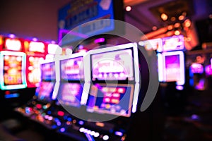 Defocused casino blur with slot machines and lights photo