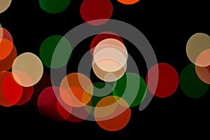 Defocused Christmas Lights. Abstract Bokeh Background. Colorful Light Circles