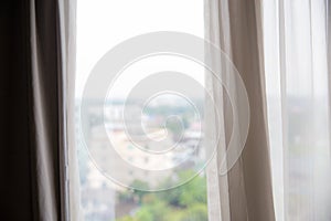 Defocused curtain window and stationery box with sunlight