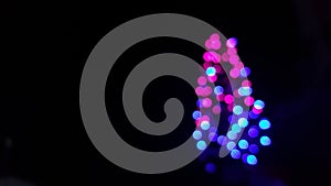 Defocused flowing light dots on color background