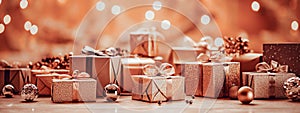 Defocused Gift boxes with christmas decoration on bokeh background.