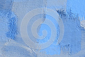 Defocused image of blue painted wall texture. Abstract texture.