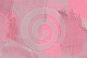 Defocused image of pink painted wall texture background.