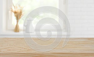 Defocused kitchen window sill background over wooden texture board