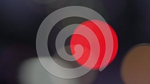 Defocused red circles light effects, abstract blurred motion boche particles