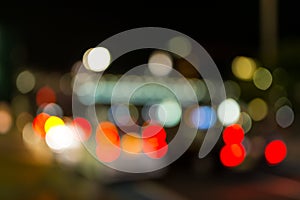 Defocused urban abstract texture, bokeh lights of city lights in