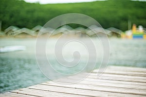 Defocusing seascape hills, the horizon, the sky fog the wooden pier.