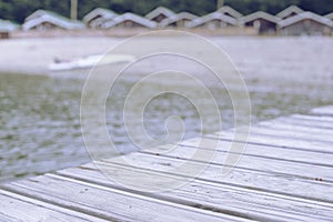 Defocusing seascape hills, the horizon, the sky fog the wooden pier.