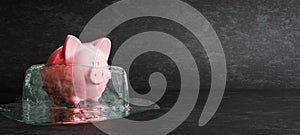Defrosting piggy bank on black background, concept of unblocking frozen funds, close up, 3D Render