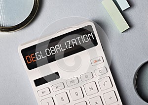 Deglobalization in business and commerse concept. Word on calculator about anti globalism, reverse globalization
