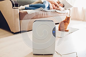 Dehumidifier with touch panel, humidity indicator, uv lamp, air ionizer, water container works at home. Air dryer