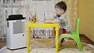 The dehumidifier works in the children's room