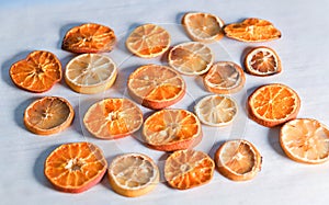 Dehydrated food. Top view with a lot of dried oranges and lemons.