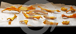 Dehydrated homemade pumpkin dog treats in the pan.