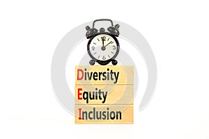 DEI diversity equity and inclusion symbol. Concept words DEI diversity equity inclusion on blocks. Beautiful white background.