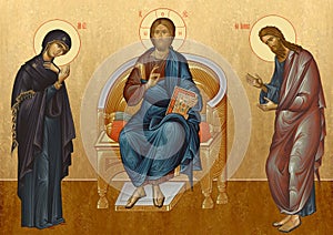 Deisus, the Saviour on the throne on the left, the mother of God on the right, John the Baptist, an Orthodox icon made according t