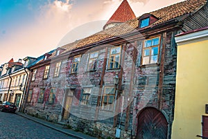A delapidated, historic wooden building; Old Towne Tallinn, Estonia