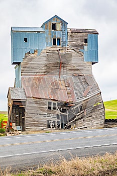 Delapidated old grain silo along a road in the Palouse Hills