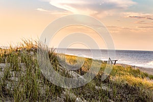 East coast dune beach grass wood lifeguard stand sunset